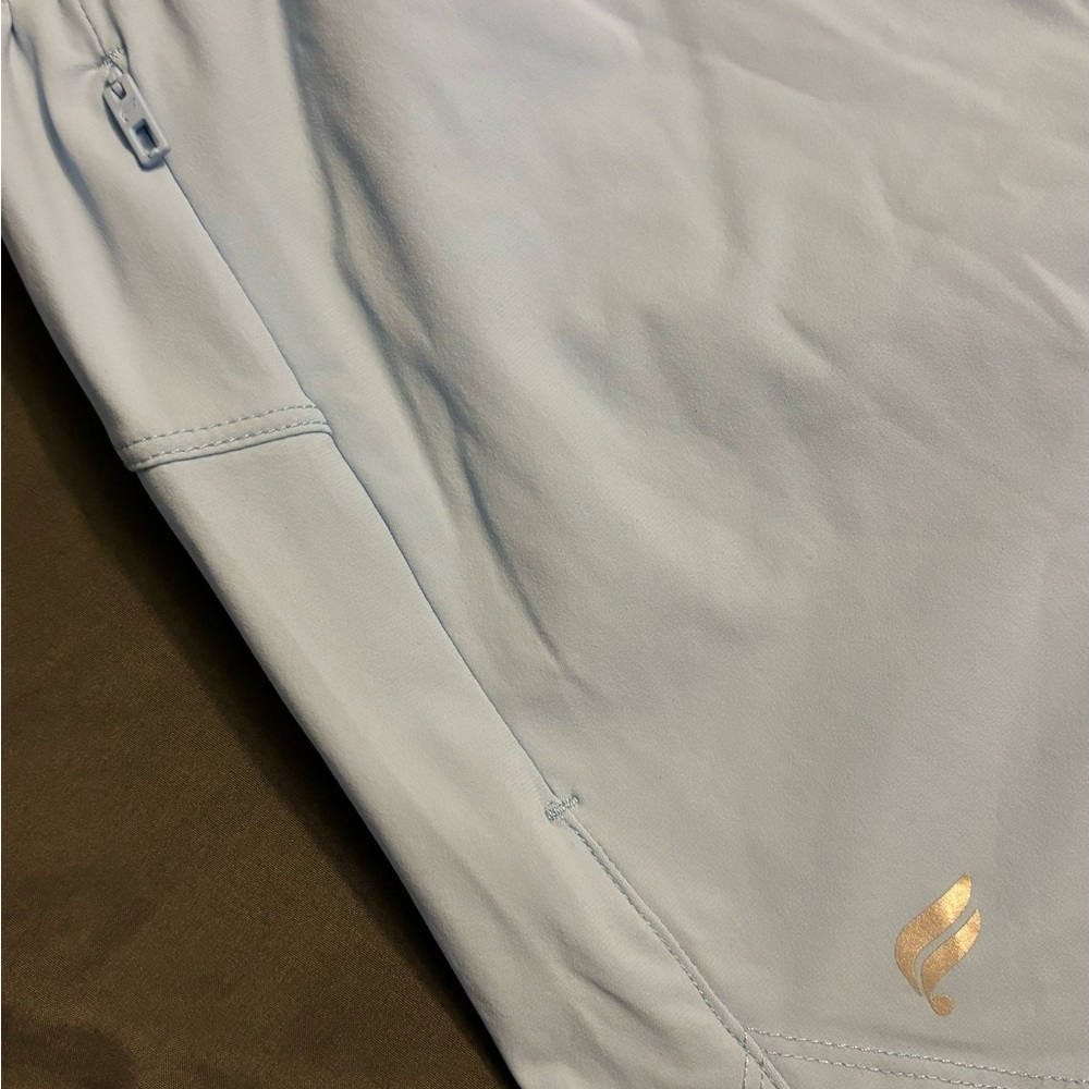 Fabletics Blue Shorts with Red Logo - Picture 2 of 5